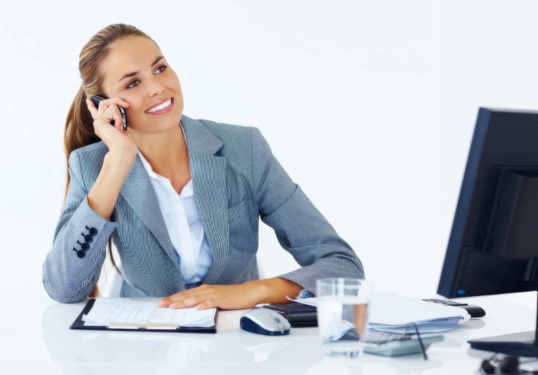 business-woman-on-phone-at-desk