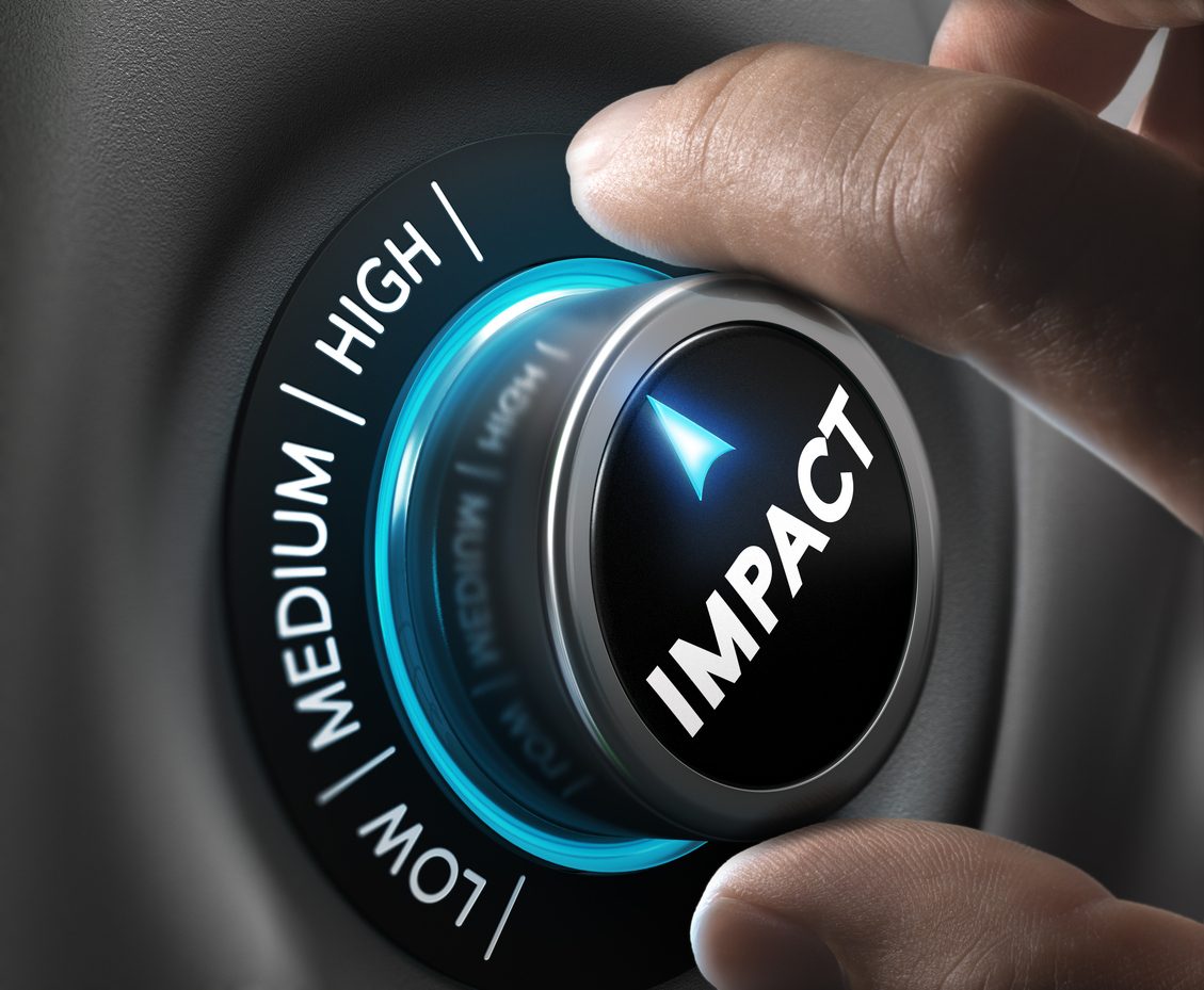 Man hand turning a knob in the highest position, Concept image for illustration of high impact communication and advertising campaign.